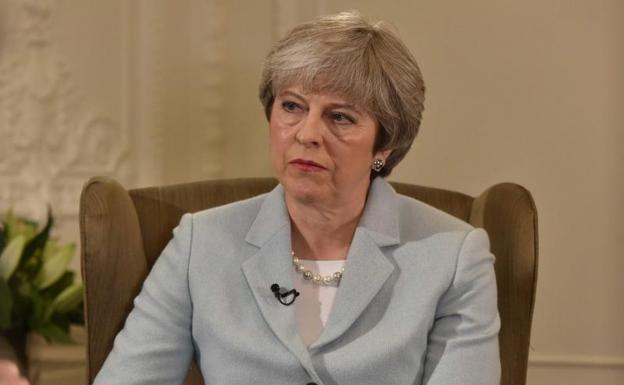 Theresa May confirma un reajuste inminente de su Gobierno