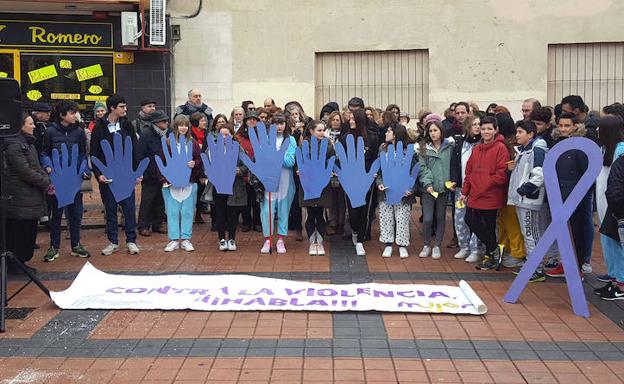 Manos moradas para decir 'basta'