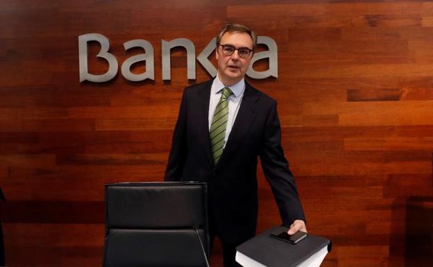 El beneficio de Bankia cae un 24,5% por menos plusvalías y el coste de BMN