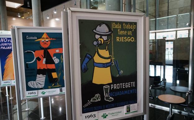 Una exposición rememora con 48 carteles la prevención de los riesgos laborales en el siglo XX