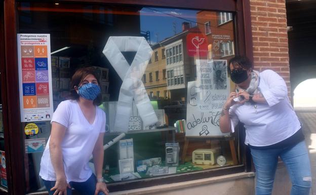 Los comercios de Aguilar, de colores contra el cáncer