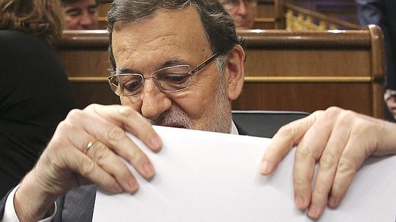 Rajoy habla de Mato a la segunda