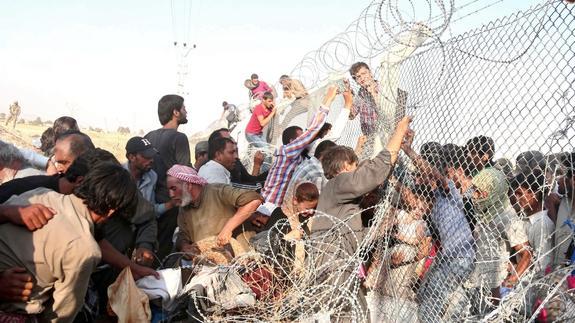 Turquía pide a Europa más ayuda para gestionar el flujo migratorio de Siria e Irak