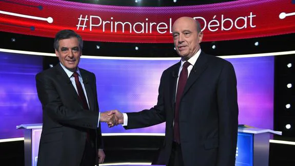 Fillon avanza hacia el liderazgo de la derecha francesa tras el debate con Juppé