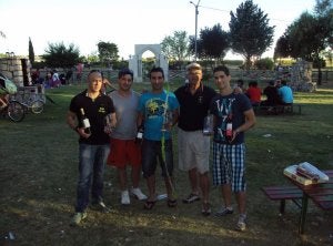 Un torneo de tiro con arco culmina la paella popular de Olombrada